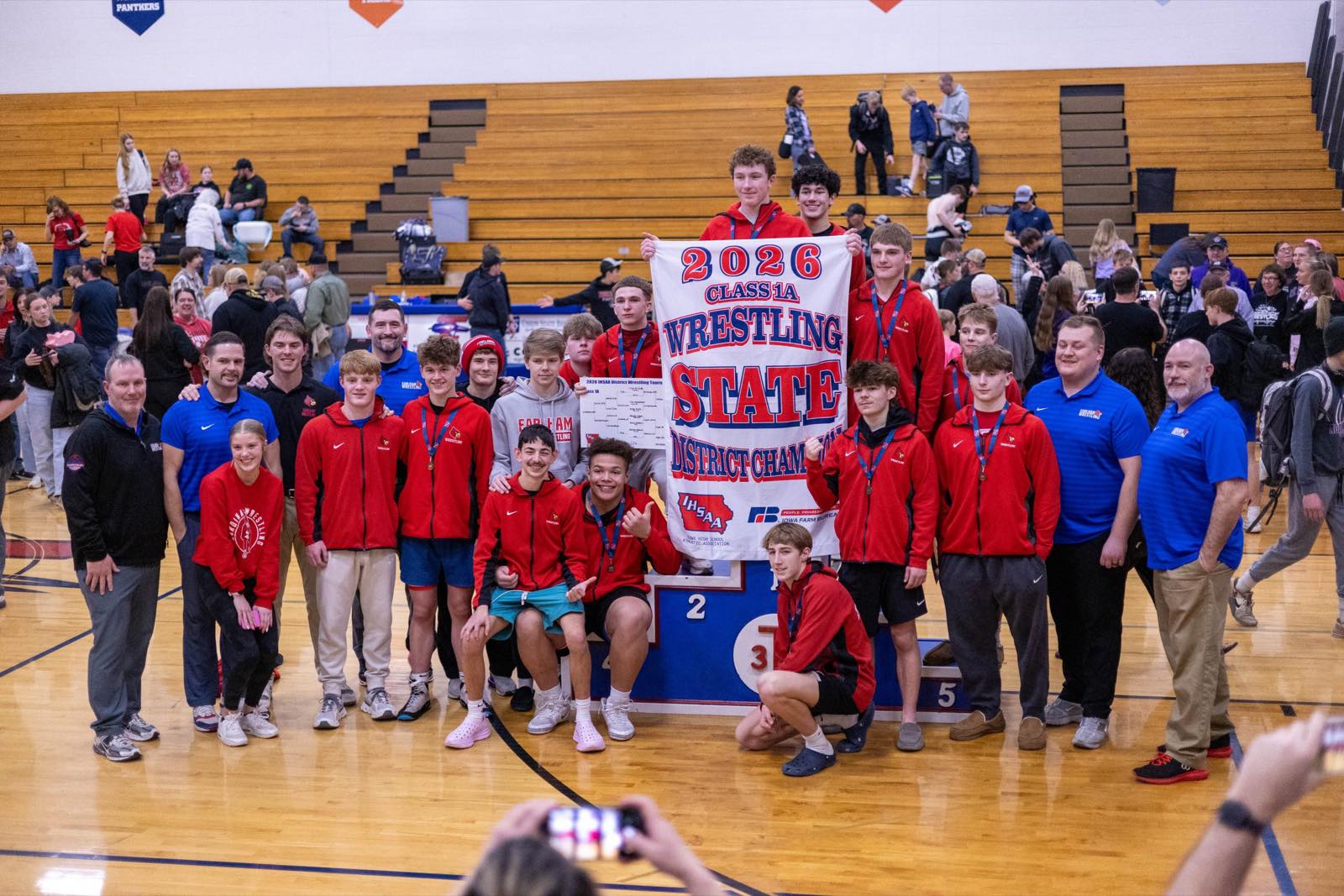 Earlham Cardinals with the 2026 Class 1A State District Champions banner