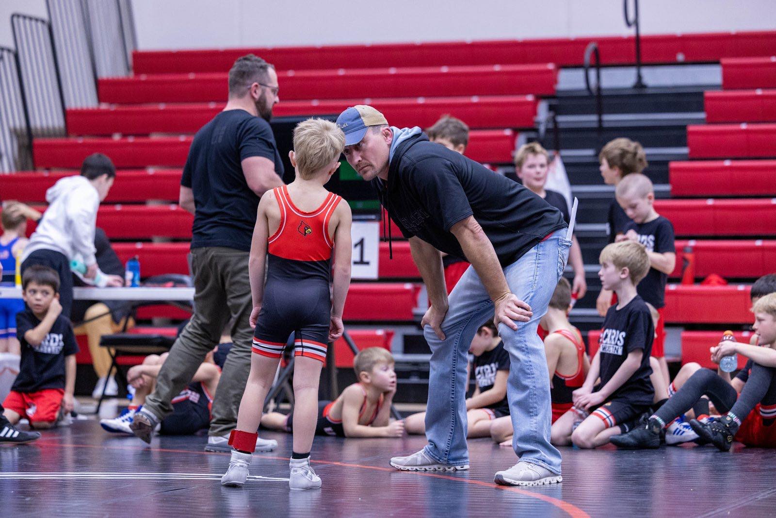 Coach Christensen with a youth wrestler