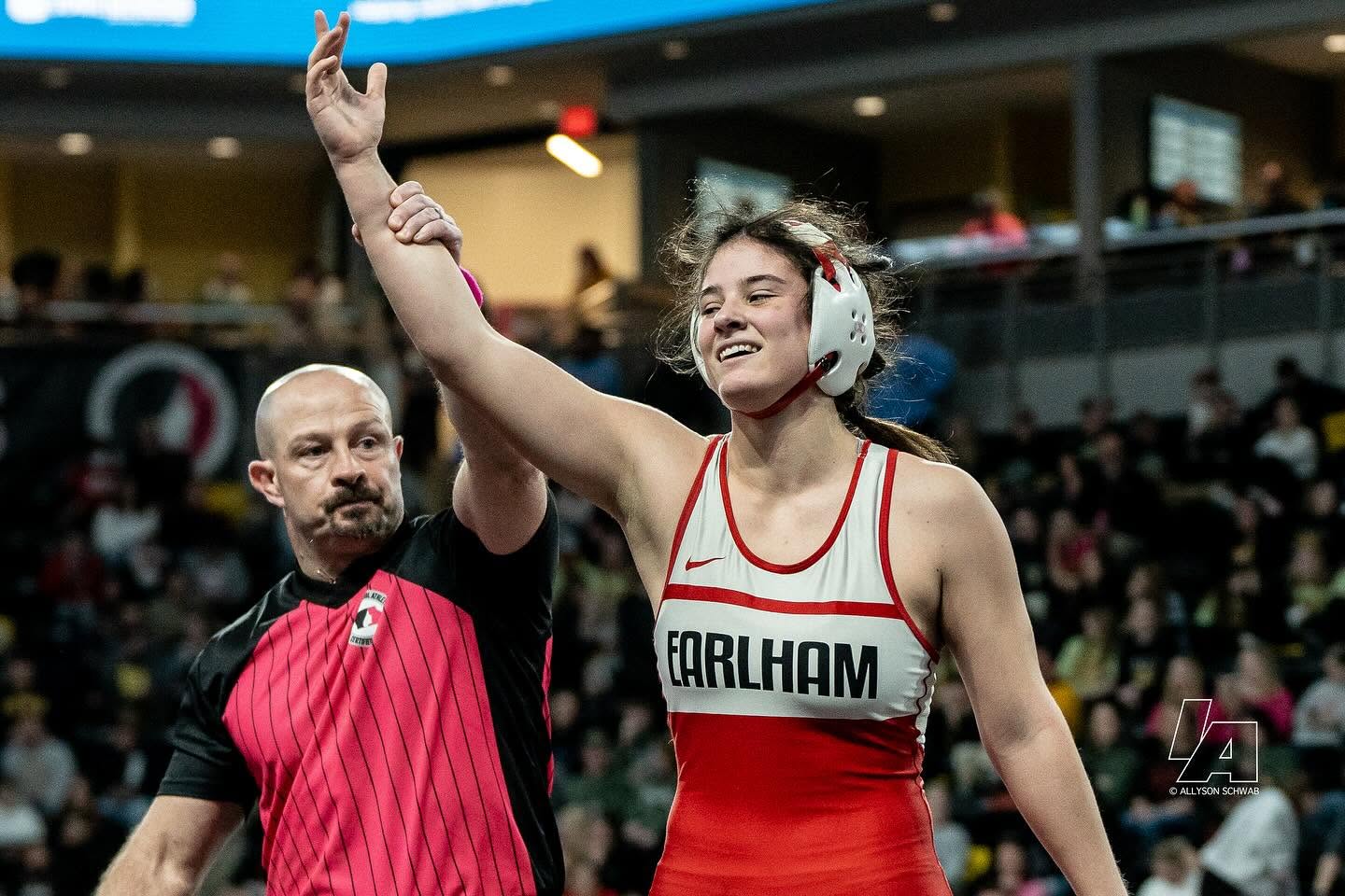 Haley Glade gets her hand raised at the IGHSAU state tournament