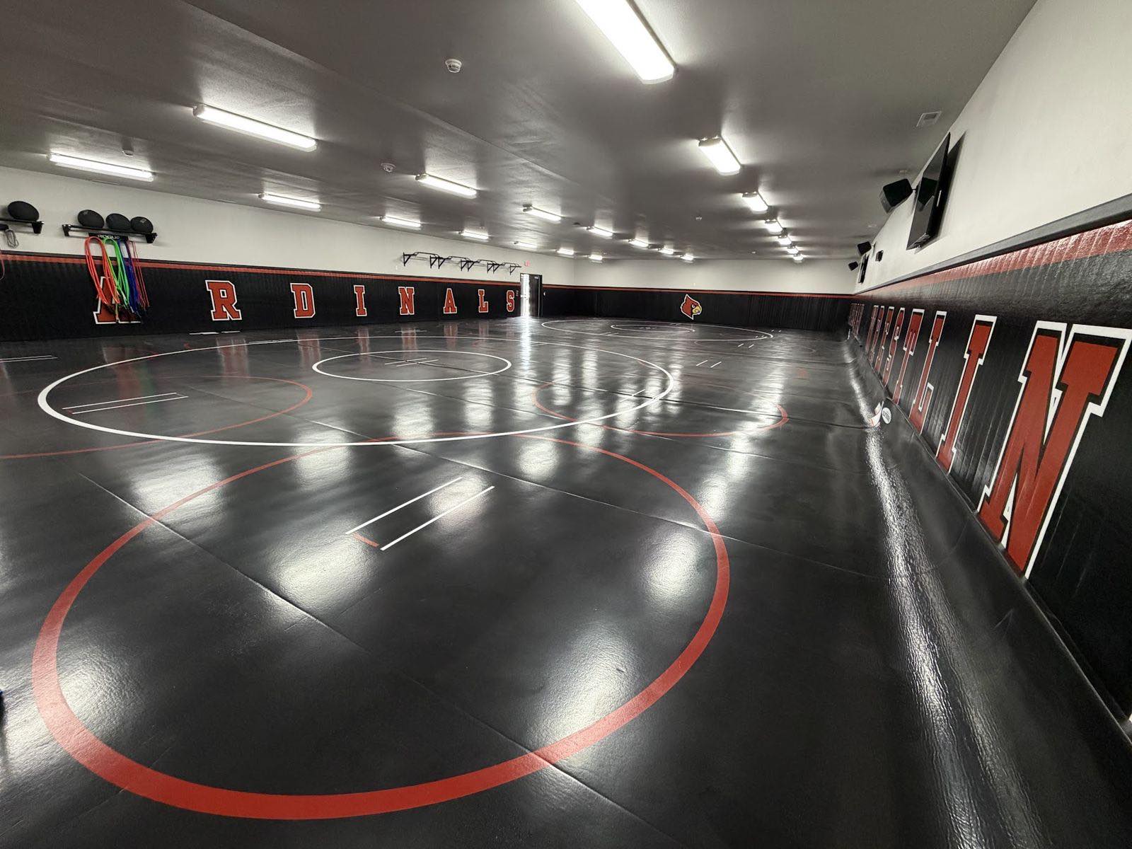 Black mats with Cardinals wall pads