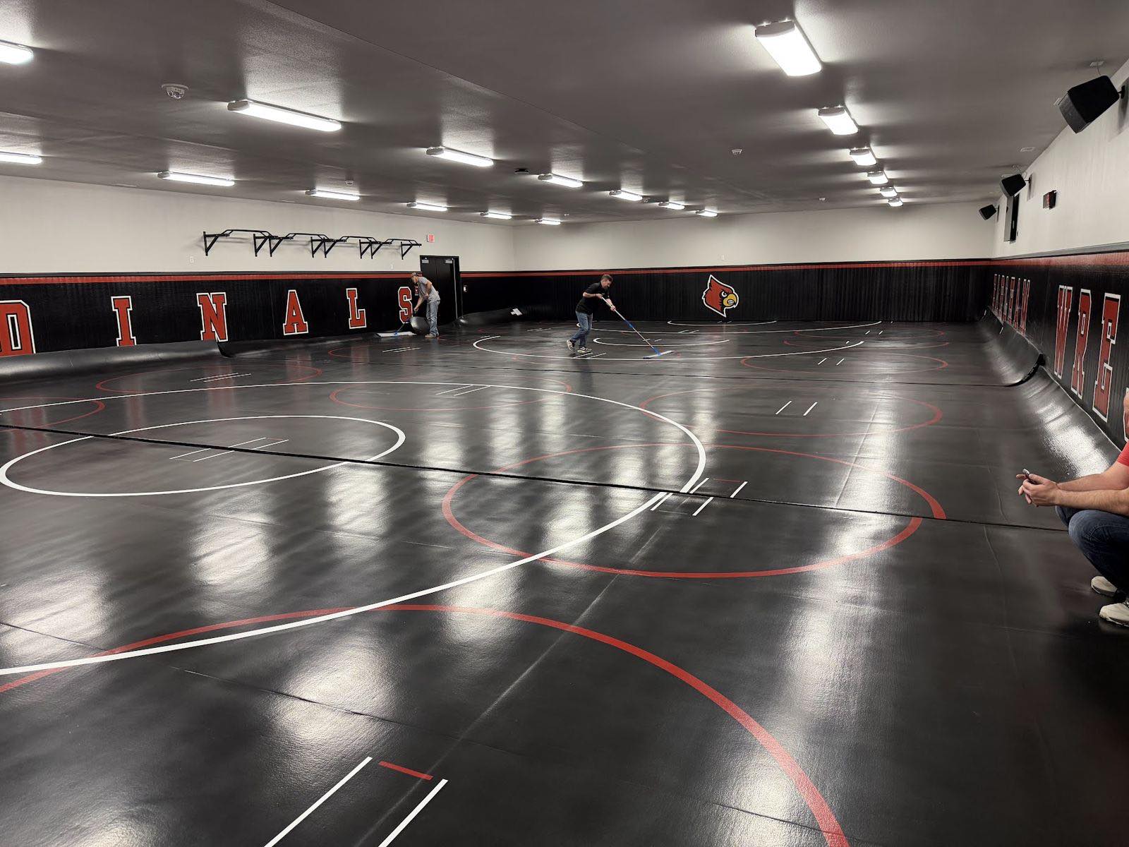 Cleaning the new mats